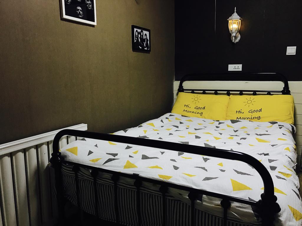 Djmt Universal Guest House Xian Quarto foto
